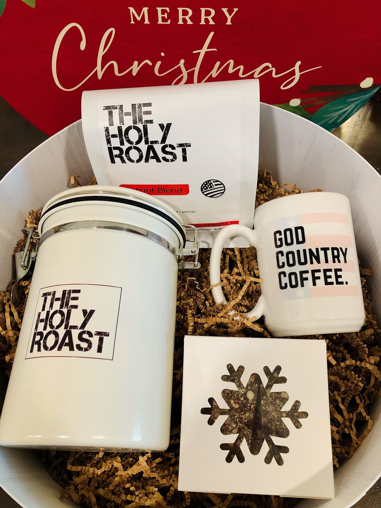 Christmas Coffee Gift Set, 12oz organic coffee, large stainless coffee tin, 15oz God Country Coffee mug, 4oz of handmade almond toffees, all presented in a decorative Christmas box.